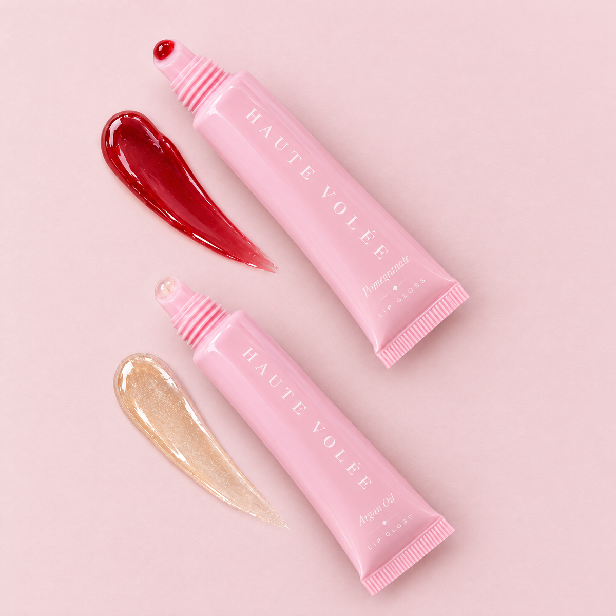 Lip Gloss Argan Oil: Tube mit Swatch der Gloss-Textur (KI-generiertes Bild)